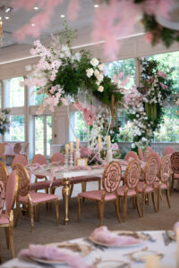 Class Event Rentals Rosabelle Chairs in pink and gold and Athena table in white and gold in wedding seating area