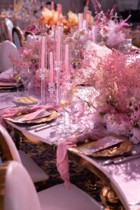 Class Event Rentals serpentine table with ornate setting at wedding