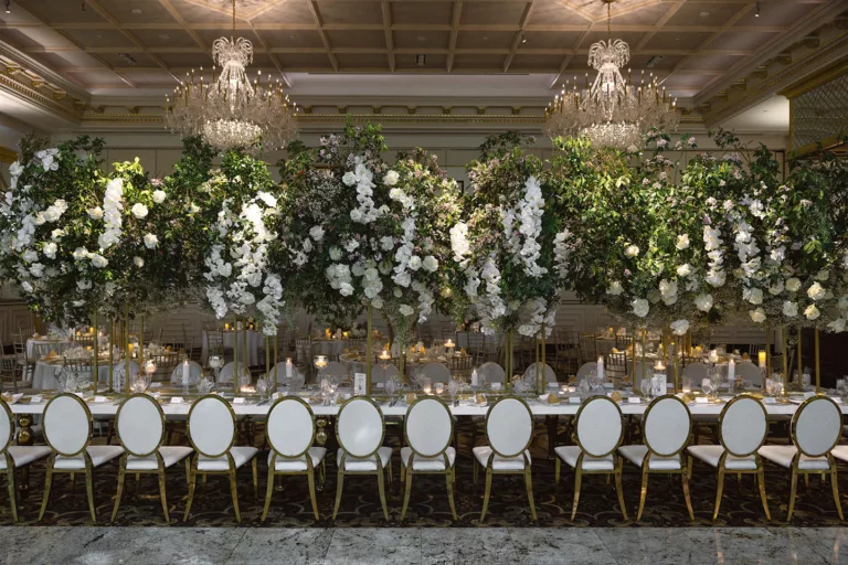Class Event Rentals luxury white chairs in wedding ceremony