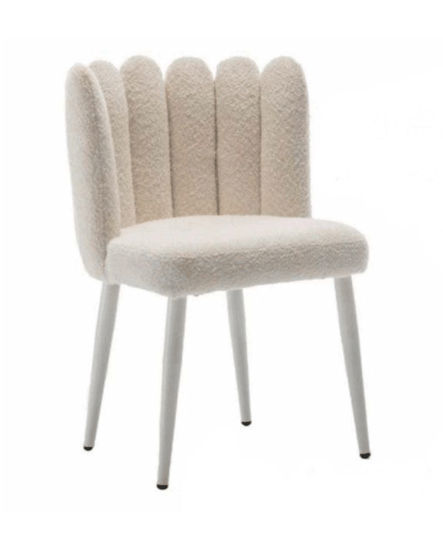 Modern chair with a white, plush, vertical channel tufted backrest and seat, supported by four sleek metallic legs.