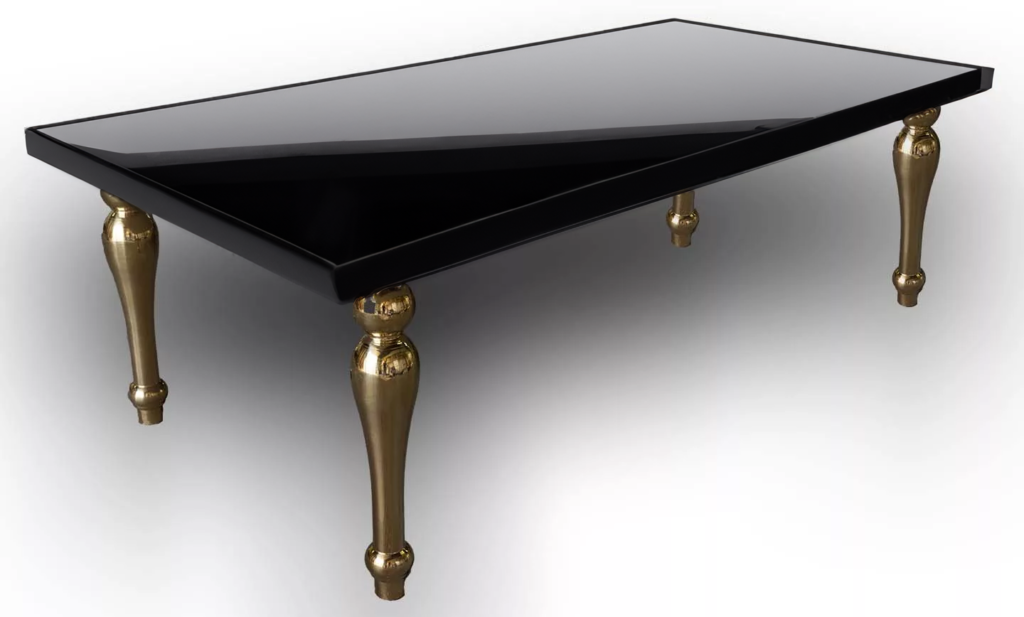 A sleek black rectangular acrylic table featuring ornate golden legs, each adorned with golden intricate details and ending in spherical feet, against a white background.
