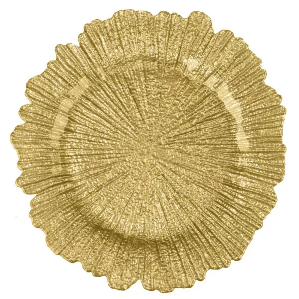 A textured, gold-colored charger plate with a pattern resembling a natural tree ring or a radial burst design, giving a vibrant, ornamental appearance.