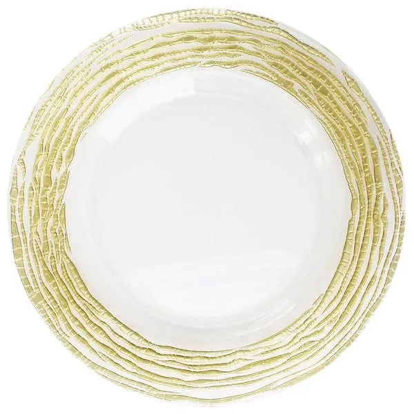 A stack of white ceramic charger plates with decorative green and gold edges, viewed from above. The plates are centered, displaying the intricate design on the borders.