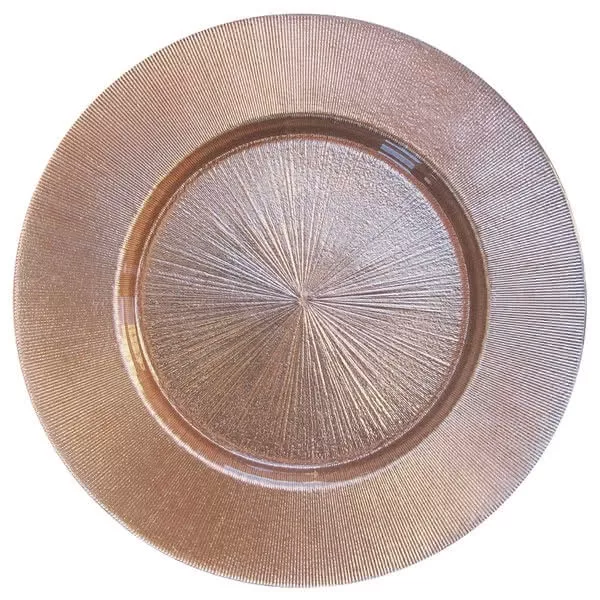 A textured bronze charger plate with a circular pattern emanating from the center, creating a radiant effect on your dining table.