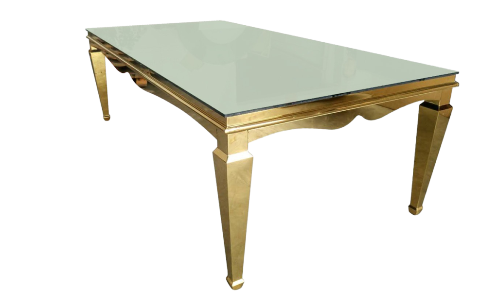 A modern glass-top table with a reflective gold frame and tapered legs, isolated on a white background.
