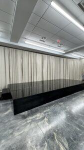 Black acrylic stage rental for wedding reception or corporate events in New Jersey